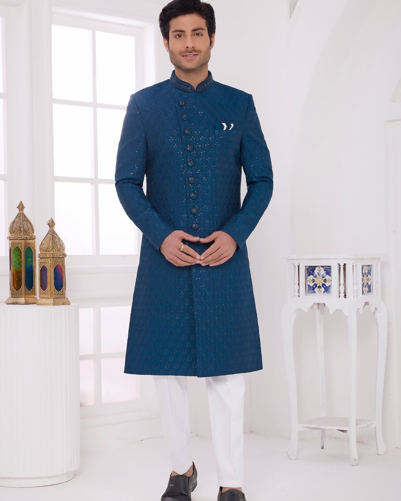 Royal elegance meets modern style with this stunning Navy Blue Designer Indo Western Jacket Set